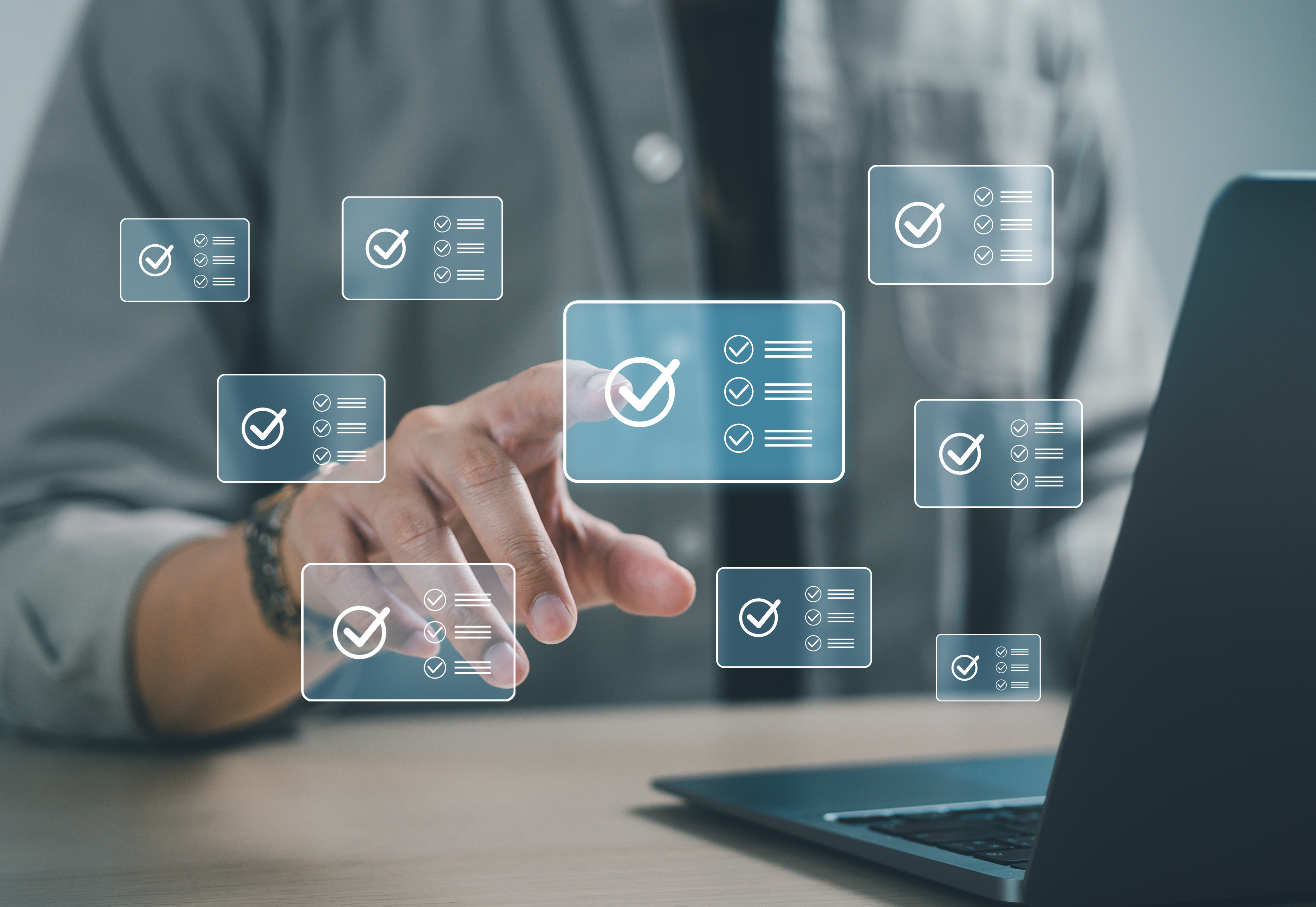 Businessman doing online survey and digital form checklist on virtual screen. Document management system, online document database, digital document icon and online document approval.